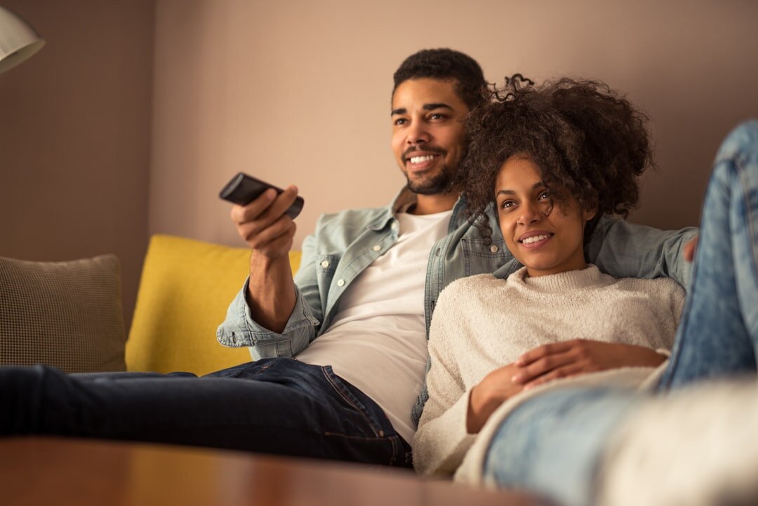 people watching tv together