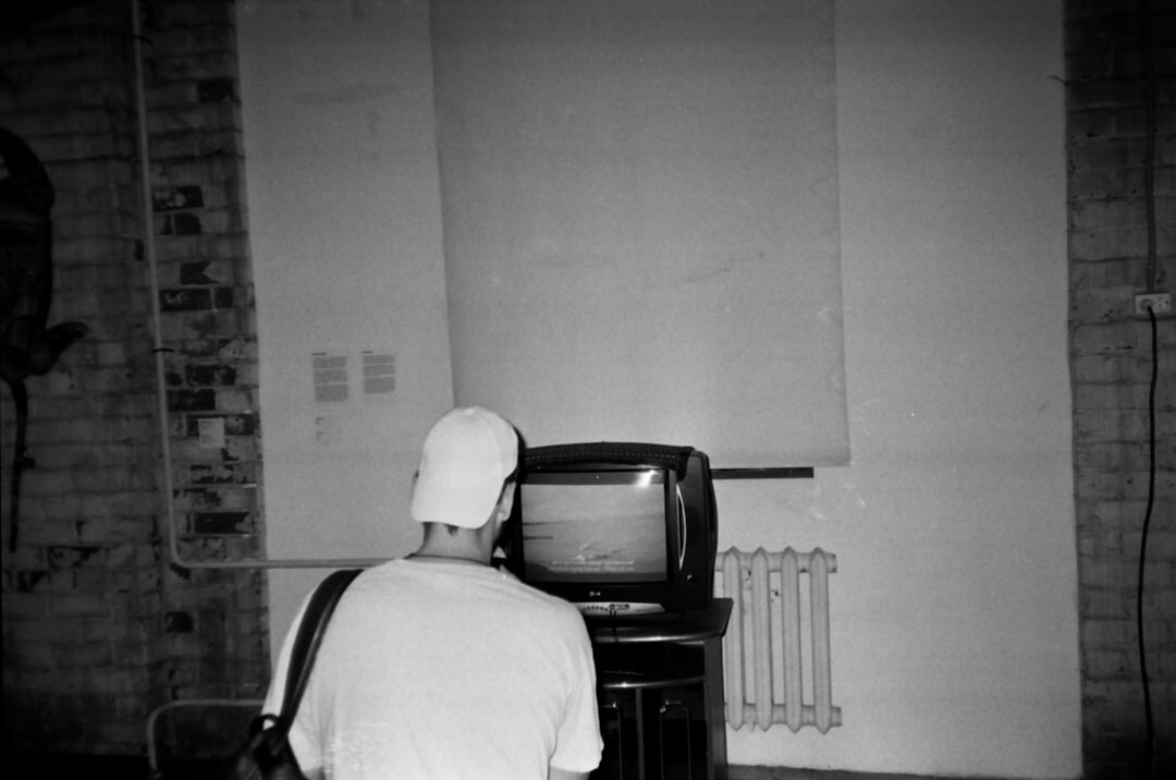 person watching old tv